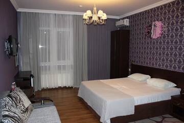 Двухместный номер с 2 двуспальными кроватями в Гостинице Guest House Adel
